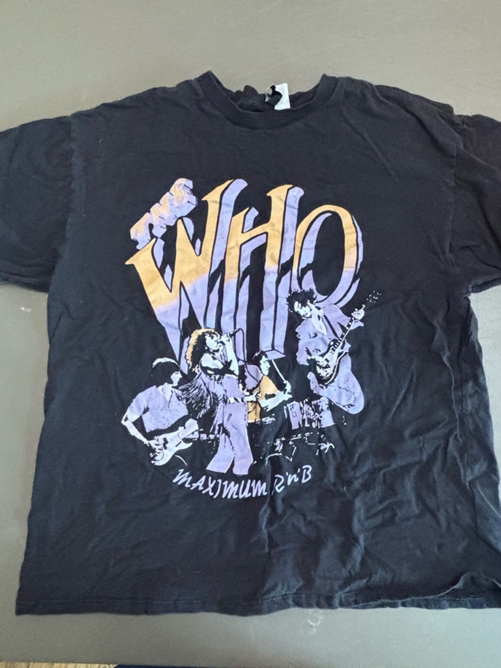Divided Black Short-Sleeve 'WHO' Graphic Tee with Purple and Gold Print